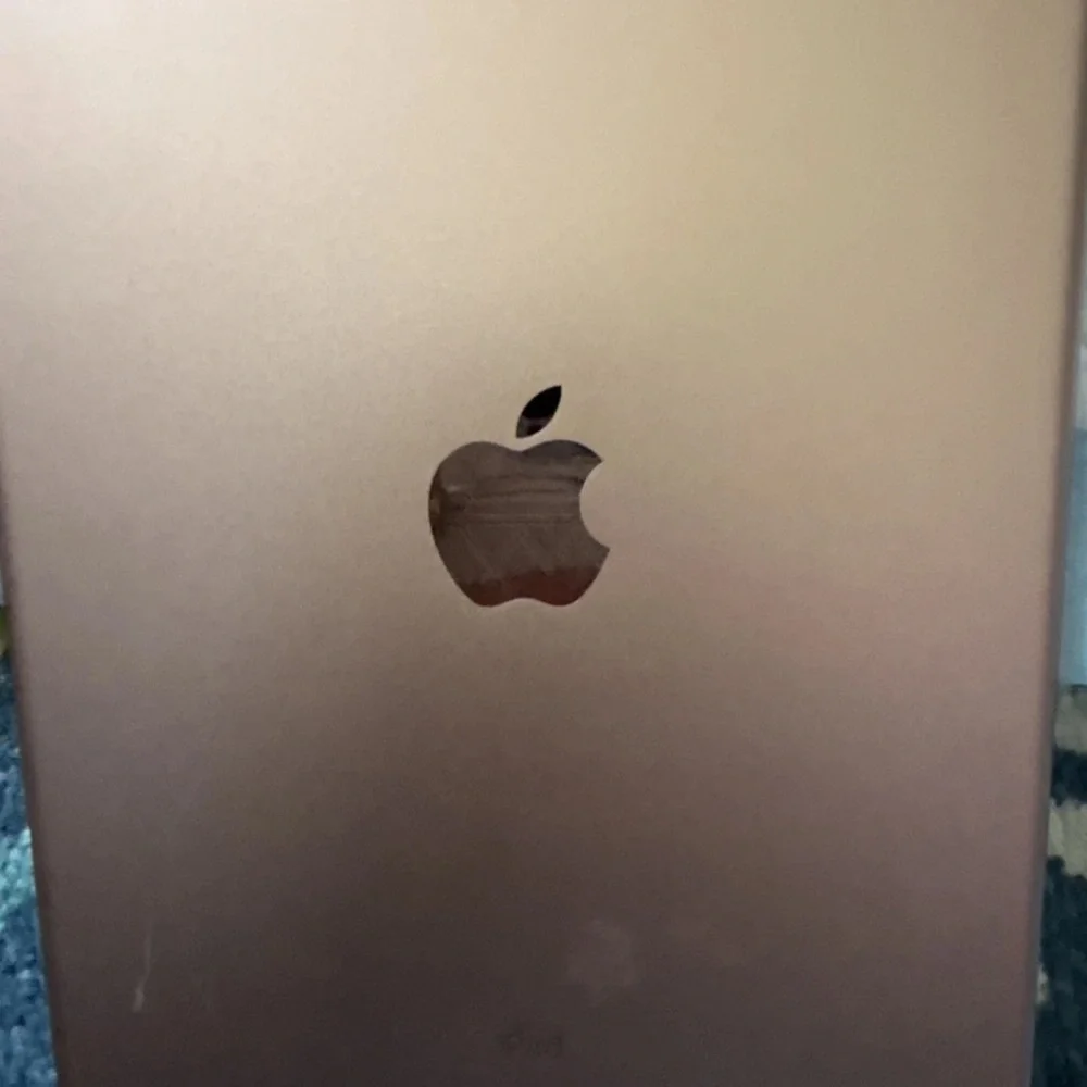 Apple Tablet in Elegant Gold 7th Generation 128GB. New in box. No SIM card.
